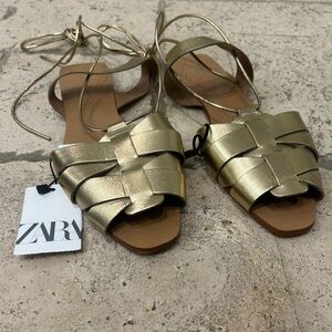 Lace up gold fisherman sandals